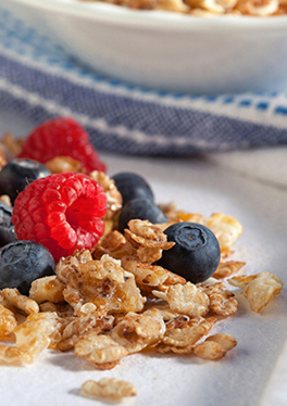 Hi! Happy Inside cereal with raspberries and blueberries