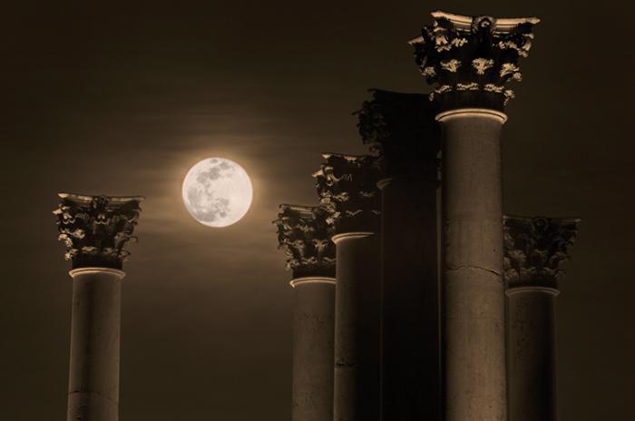 The National Capitol Columns in moonlight at the U.S. National Arboretum in Washington, D.C. 