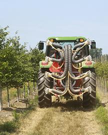 An automated spraying system attached to a tractor