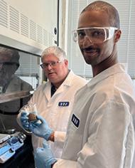 Two scientists working with nanocellulose fiber