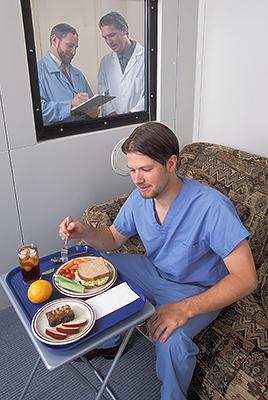A nutrition study participant eating a meal